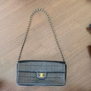 CHANEL Black Quilted Shoulder Bag with Gold Accents